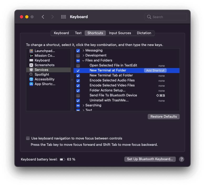 Enable the "New Terminal at Folder" service on your Mac (and add a keyboard shortcut)