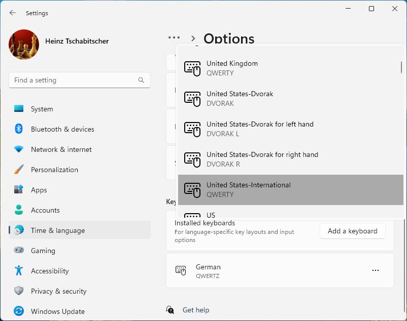 Select “United States-International” to add the US-International keyboard layout to Windows