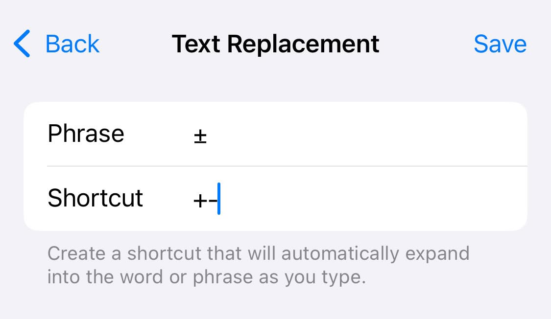 Setting up a text replacement sequence to add the plus-minus symbol on an iPhone