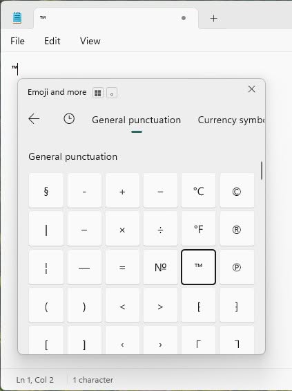 Using the emoji panel to insert the trademark symbol